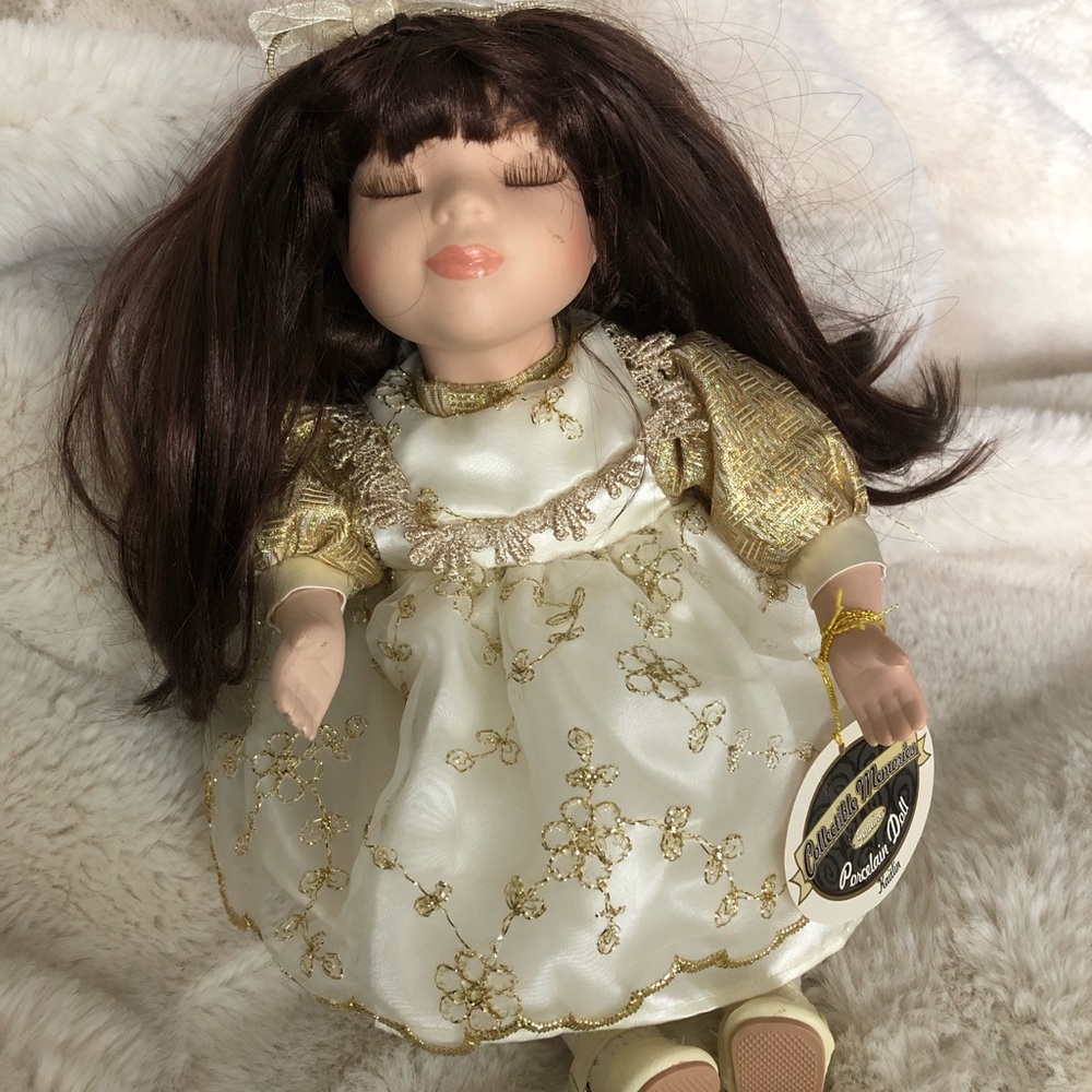 Charming Gold and White Porcelain Doll